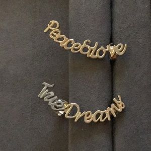 Gold and silver tone ear cuffs